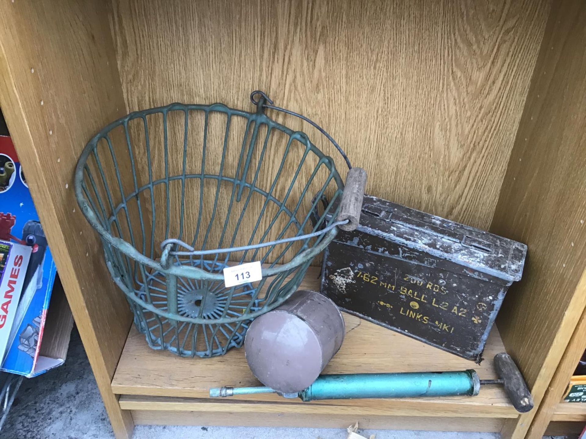 A VINTAGE POTATO BASKET, A GARDEN SPRAYER AND AMMUNITION BOX