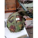 A PARACHUTIST LIGHTWEIGHT BRITISH HELMET AND BAYONET POUCH