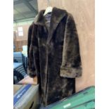 A LADIES LONG VINTAGE FUR COAT