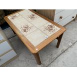 A TILE TOP TEAK COFFEE TABLE