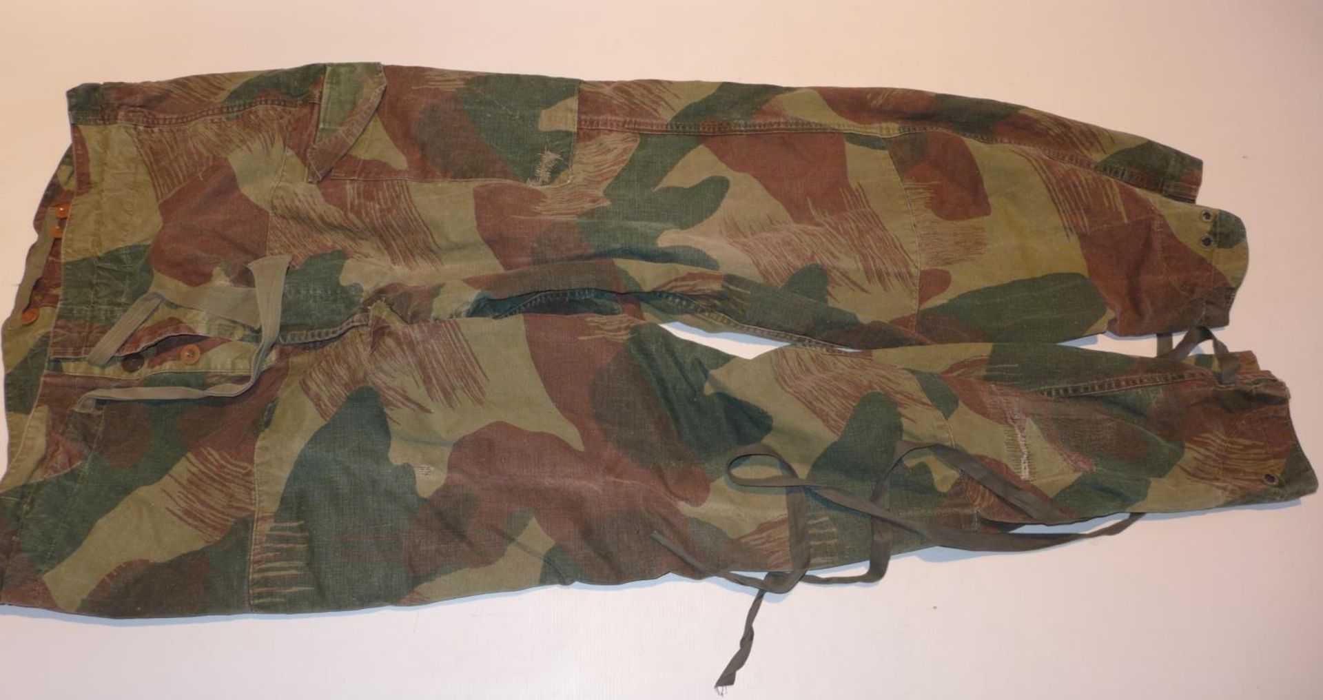 A PAIR OF CAMO TROUSERS