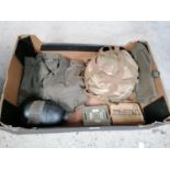 A BOX OF BRITISH ARMY HELMET, T SHIRT, BOTTLE, TROUSERS ETC