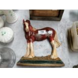 A CAST METAL HORSE DOORSTOP