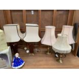 A COLLECTION OF FIVE LAMPS AND LAMP SHADES