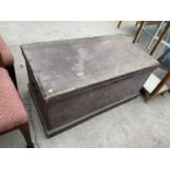 A VINTAGE PINE BLANKET CHEST WITH IRON HANDLES AND INNER CANDLE BOX