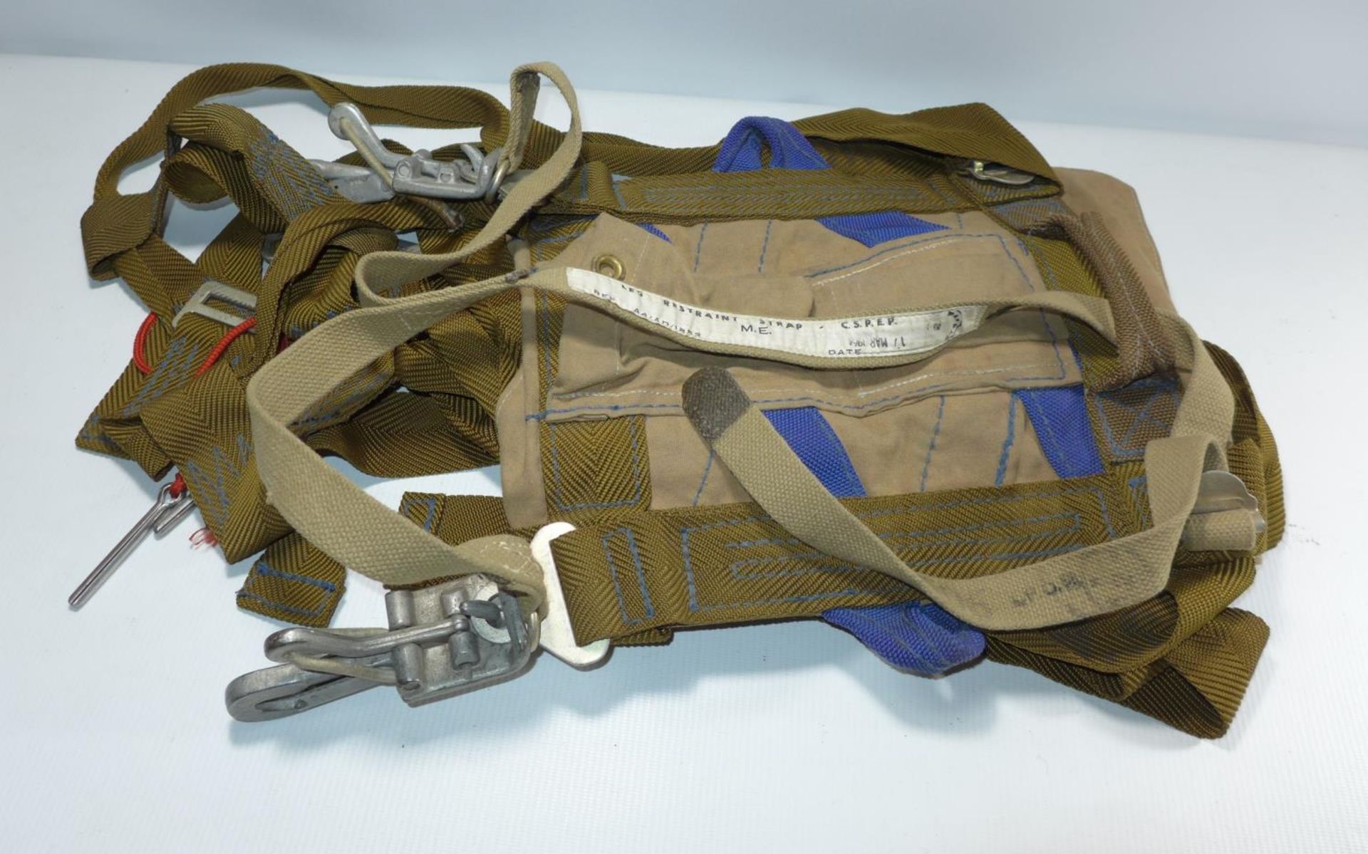 A PARACHUTE HARNESS, DATED 1964