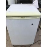 A PROLINE FRIDGE IN NEED OF CLEAN IN WORKING ORDER