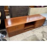 A CHERRY WOOD SIDEBOARD WITH FOUR DRAWERS