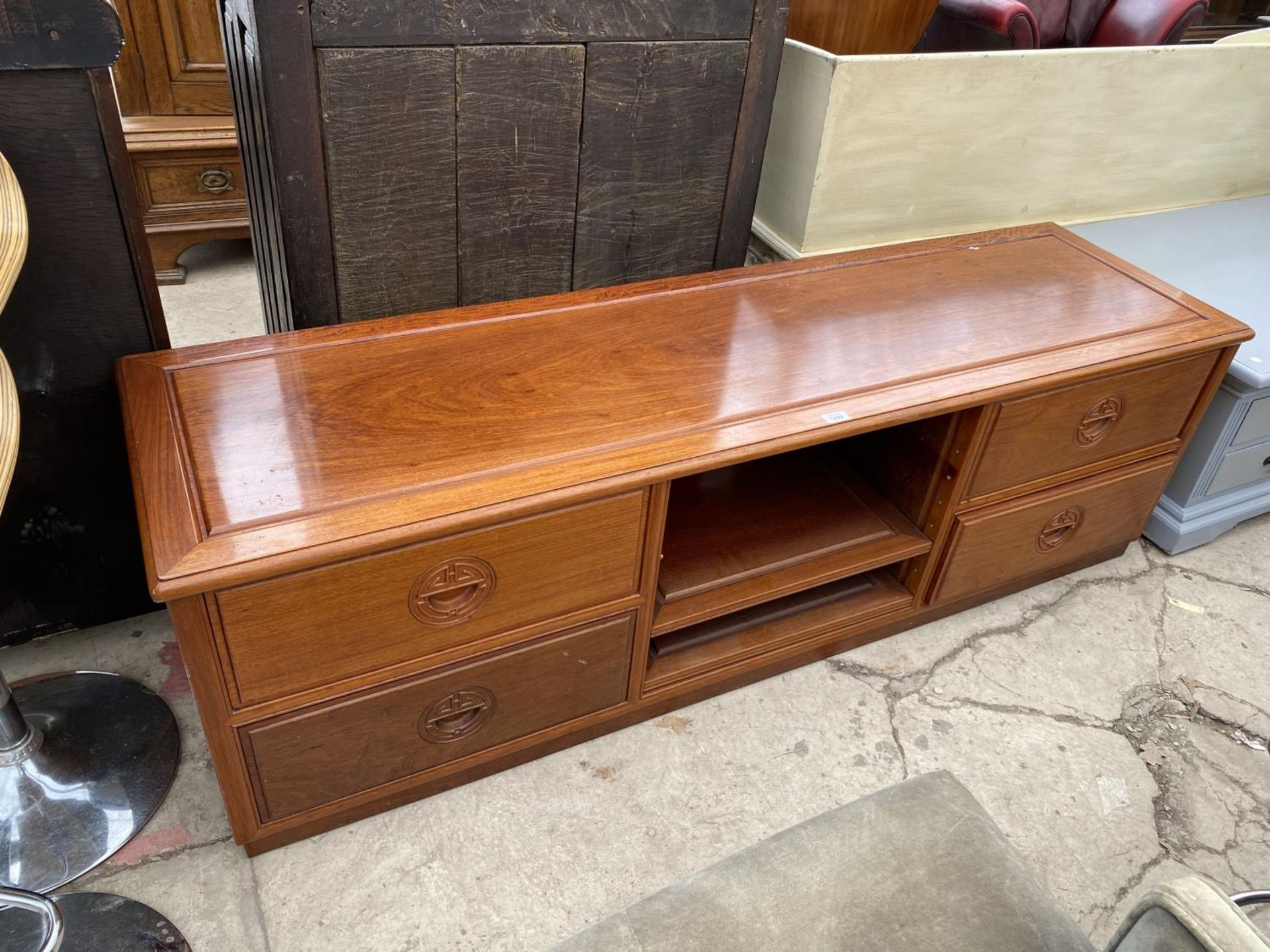 A CHERRY WOOD SIDEBOARD WITH FOUR DRAWERS