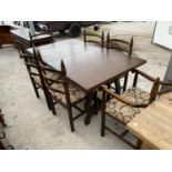 A YOUNGER TOLEDO OAK EXTENDING DINING TABLE WITH FOUR DINING CHAIRS AND TWO CARVERS