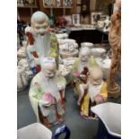 FOUR CERAMIC ORIENTAL FIGURES