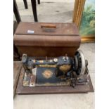 VINTAGE JONES SEWING MACHINE IN A WOODEN CASE