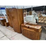 A WALNUT DRESSING TABLE, TWO WARDROBES AND A BEDSIDE CABINET