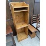 A PINE BOOKSHELF AND AN OAK MAGAZINE RACK TABLE