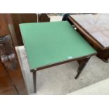 A FOLDING CARD TABLE WITH GREEN BAIZE TOP