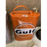 A ORANGE METAL GULF PETROL CAN