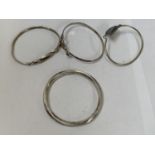 FOUR SILVER BANGLES