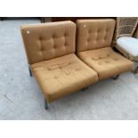 TWO RETRO LOUNGE CHAIRS