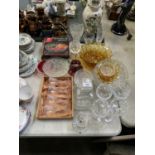 A COLLECTION OF VARIOUS GLASSWARE TO INCLUDE VASES, WINE GLASSES, COLOURED EXAMPLES ETC