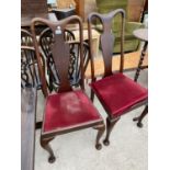 TWO HIGH BACKED MAHOGANY DINING CHAIRS