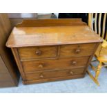 A PINE CHEST OF TWO SHORT AND TWO LONG DRAWERS