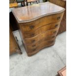 A WALNUT SERPENTINE FRONT CHEST OF FIVE DRAWERS