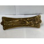 A VICTORIAN BRASS DOOR HANDLE