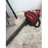 A MOUNTFIELD PETROL CHAIN SAW FOR SPARES OR REPAIR