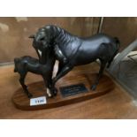 A BESWICK BLACK BEAUTY AND FOAL CERAMIC HORSE MODEL ON WOODEN BASE
