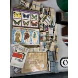 A COLLECTION OF ASSORTED CIGARETTE CARDS AND ALBUMS