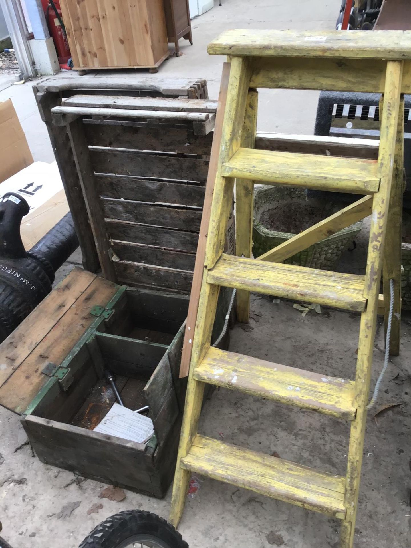 A VINTAGE FOUR RUNG STEP LADDER (REPAIRED), A WOODEN CHEST, TWO WOODEN POTATO BOXES ETC