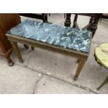 A MARBLE AND GILDED COFFEE TABLE