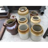 SIX VINTAGE GLAZED POTS, A TREACLE GLAZED JUG AND COFFEE POT