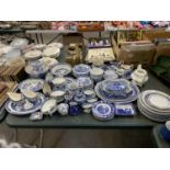 A HUGE COLLECTION OF ENGLISH BLUE AND WHITE PATTERNED CHINA TO INCLUDE JUGS, PLATES, CUPS ETC