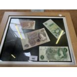 FOUR BANK OF ENGLAND NOTES IN A FRAME