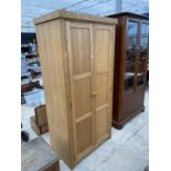 A MODERN OAK WARDROBE