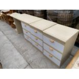 TWO MODERN BEDSIDE CHESTS OF THREE DRAWERS AND A DRESSING TABLE