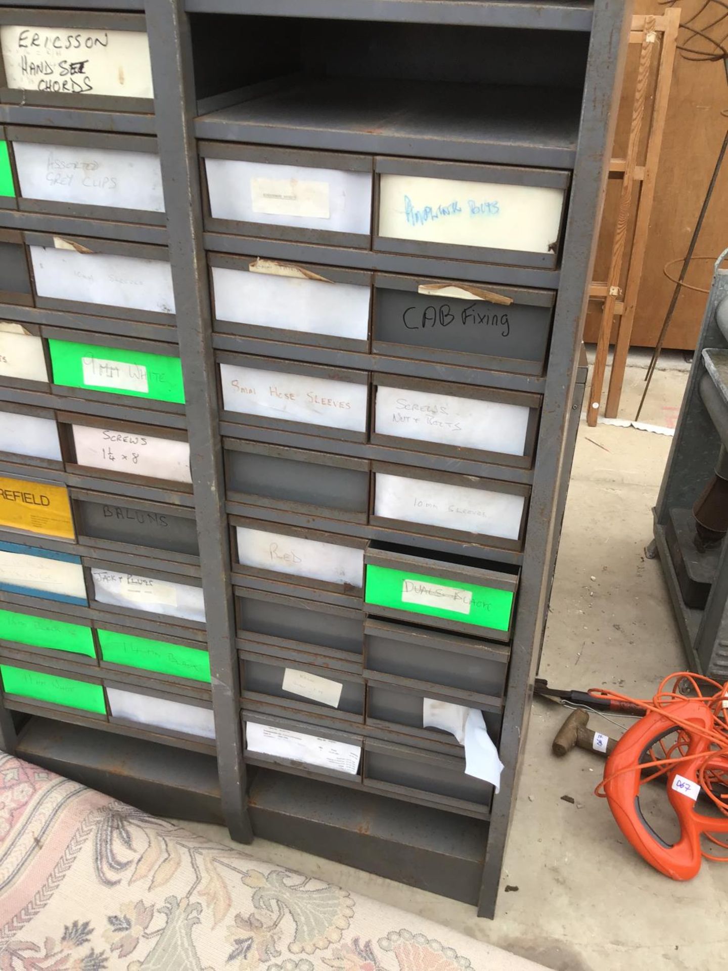 A TALL METAL STORAGE UNIT WITH THIRTY FOUR SMALL DRAWERS AND ELEVEN PIGEON HOLES - Image 2 of 4