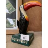 A CAST IRON GUINNESS TOUCAN MODEL