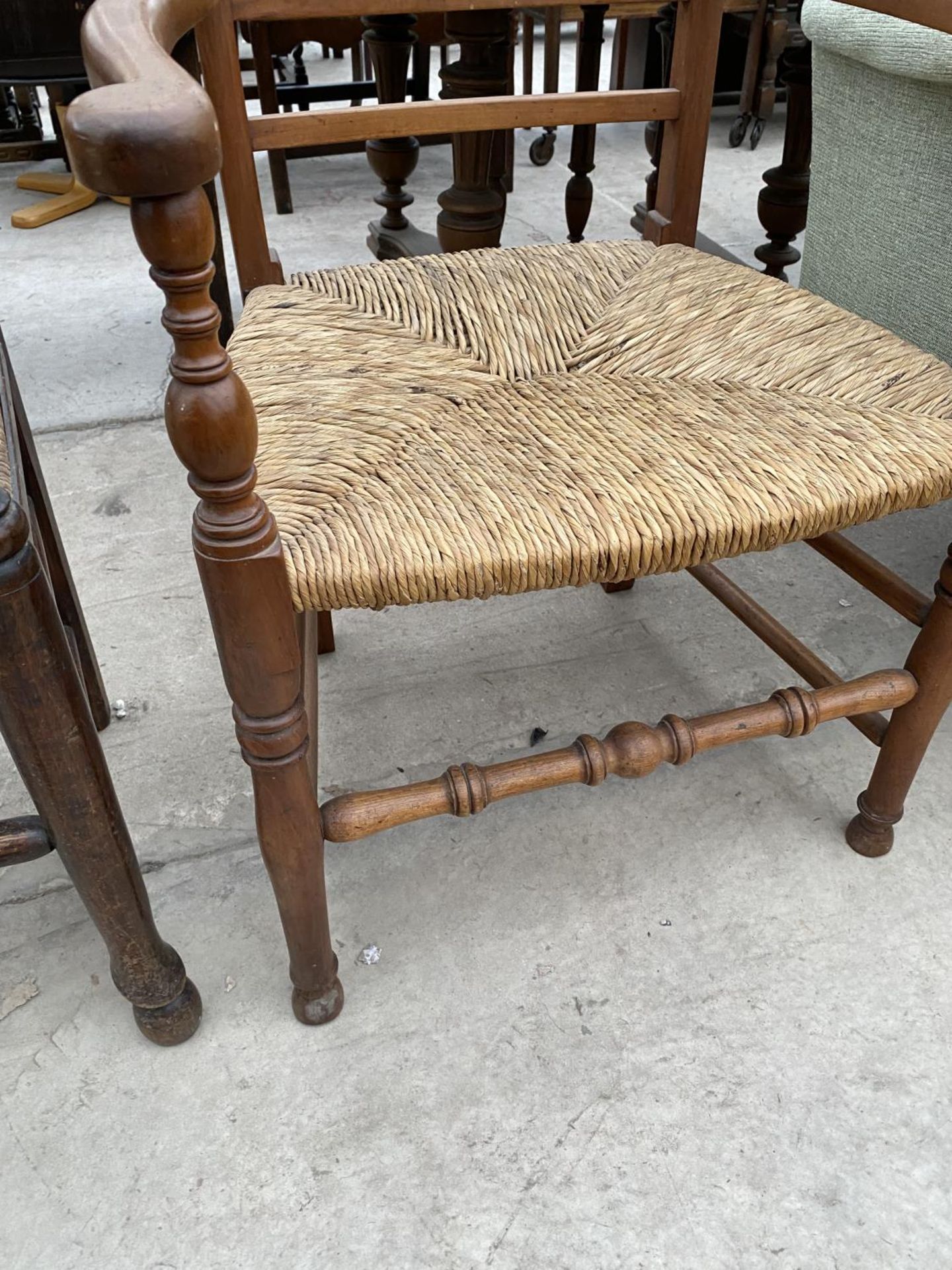 TWO LADDER BACK CARVER DINING CHAIRS WITH RUSH SEATS - ONE OAK, ONE MAHOGANY - Image 5 of 5