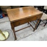 AN OAK SIDE TABLE WITH SINGLE DRAWER