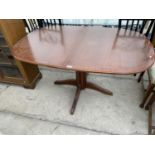 A MAHOGANY EXTENDING DINING TABLE