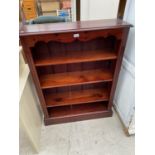 A PINE FOUR TIER BOOKCASE