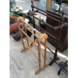 TWO TOWEL RAILS TO INCLUDE AN ORNATE MAHOGANY EXAMPLE AND A PINE