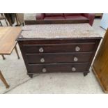 A PINE CHEST OF THREE DRAWERS WITH GLASS EFFECT HANDLES