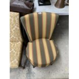 A STRIPED UPHOLSTER BEDROOM CHAIR