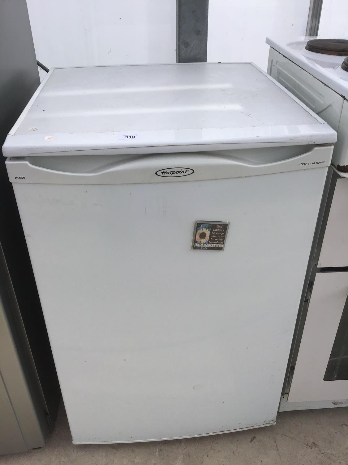 A HOTPOINT ICED DIAMOND FRIDGE IN WORKING ORDER