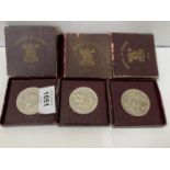 A COLLECTION OF THREE 1951 BOXED CROWN COINS