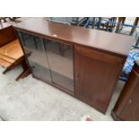 A MAHOGANY CABINET WITH SINGLE DOOR AND TWO SLIDING GLASS DOORS