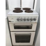 A NEW WORLD COOKER WITH FOUR RING HOB,DOUBLE OVEN AND GRILL